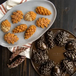 Sale NORDIC WARE Moule à Gâteaux Pommes de Pin (x9) Bronze